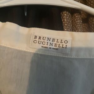 Size medium sheer , cap sleeved, A symmetrical top.